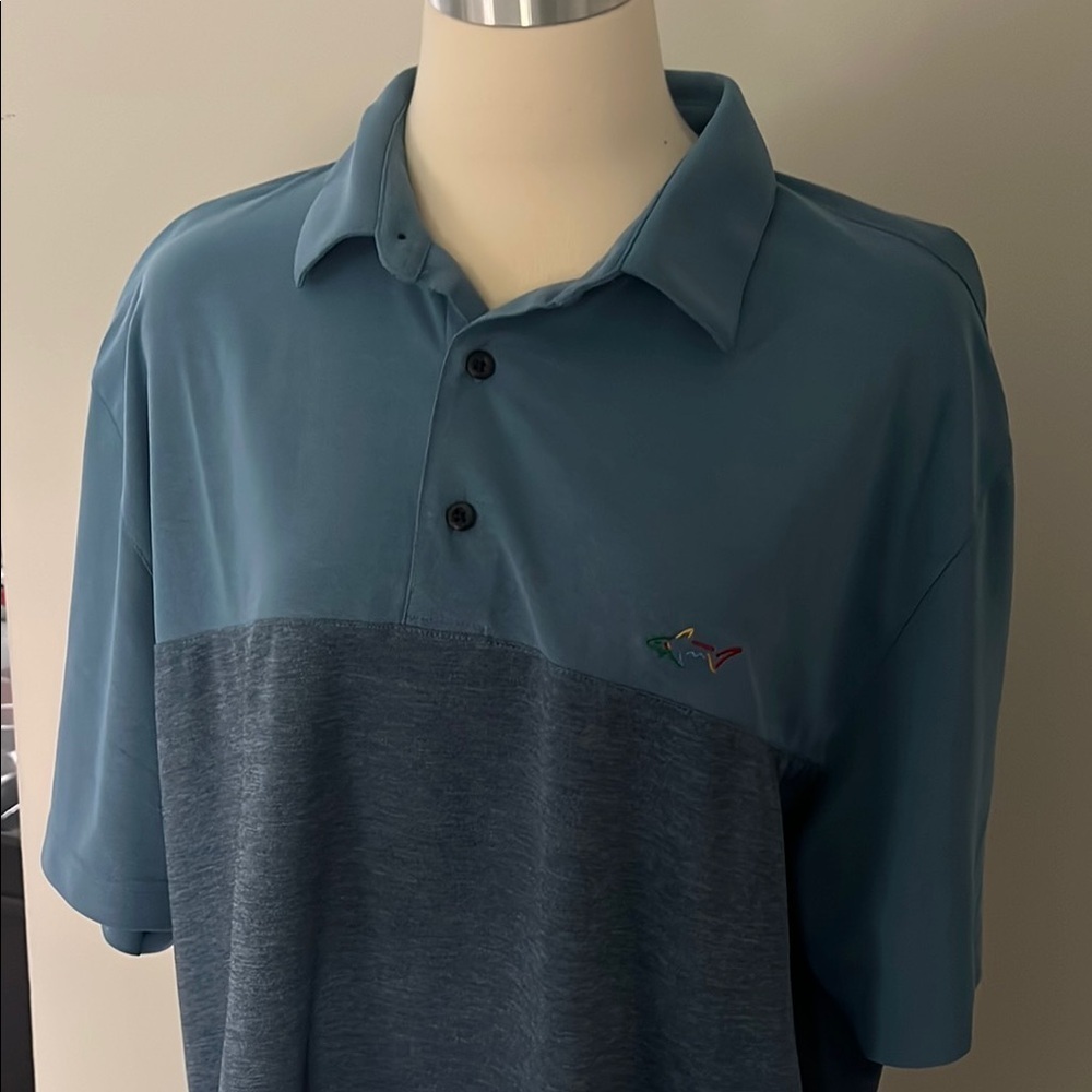 Greg Norman Collection Blue Polo Shirt with Classic Collar and Textured Fabric